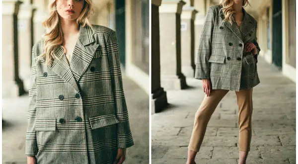 Kobieta w dwurzędowej marynarce w kratę i beżowych spodniach prezentuje styl smart casual.