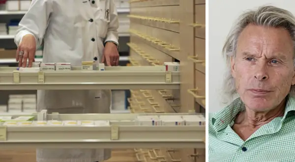 En person i vit rock hanterar mediciner i ett apotek. Bredvid syns en man med grått hår. Kanske en patient som besöker sin psykiatri.