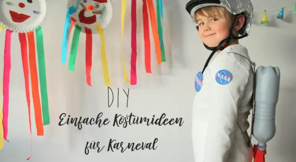 Kind im Astronauten-DIY-Kostüm mit Raketenrucksack aus Flasche. Einfache Kostüme für Kinder zum Selbermachen.