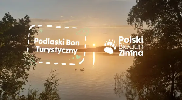 Zachód słońca nad jeziorem, z napisem "Podlaski Bon Turystyczny 2026" i "Polski Biegun Zimna".
