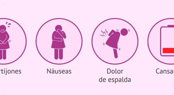 Síntomas comunes en embarazo de 39 semanas: retortijones, náuseas, dolor de espalda y cansancio.