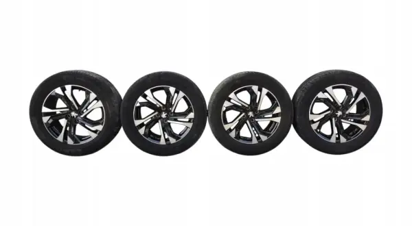 Cztery felgi z oponami Michelin, idealne do Peugeot 2008 GT, z dwukolorowym wzorem.