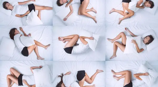 A woman in various positions on a white bed, illustrating tossing and turning at night. She clutches a pillow, seeking comfort.