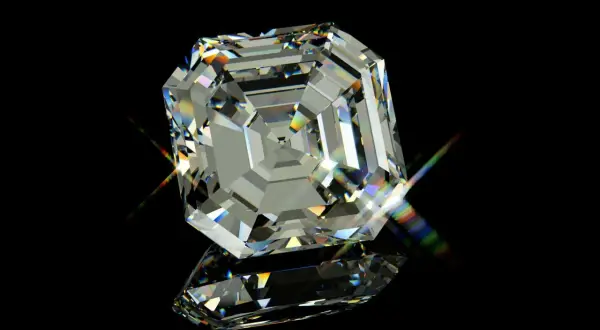 Ein glitzernder Diamant im Asscher Schliff, der auf schwarzem Hintergrund reflektiert und Regenbogenlicht bricht.