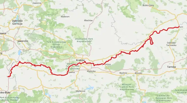 Mapa przedstawia przebieg wiślanej trasy rowerowej Kraków – Sandomierz, z zaznaczonymi miastami i parkami krajobrazowymi.