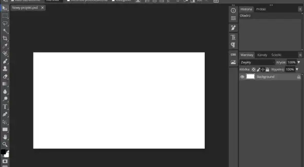 Interfejs Photopea, darmowego programu do edycji grafiki online, podobnego do Photoshopa. Widoczny pusty obszar roboczy i panel warstw.