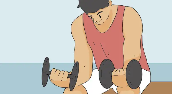 Man doing dumbbell wrist curls to learn how to get stronger wrists.