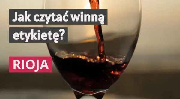 Czerwone wino z regionu La Rioja nalewane do kieliszka. Napis "Jak czytać winną etykietę?".