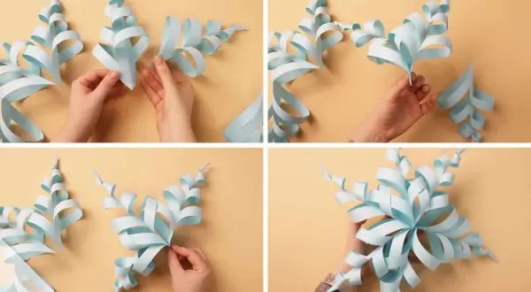 Schritt-für-Schritt-Anleitung zum Schneeflocken basteln mit Papier. Hände formen und kleben die Papierstreifen zu einer schönen Schneeflocke.