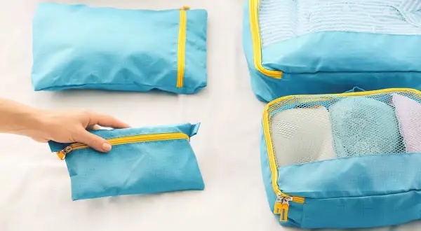 Organiza tu viaje: cómo hacer una mochila de viaje con cubos organizadores.