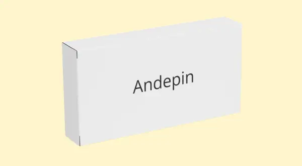 Białe pudełko z napisem "Andepin" na jasnym, żółtym tle.