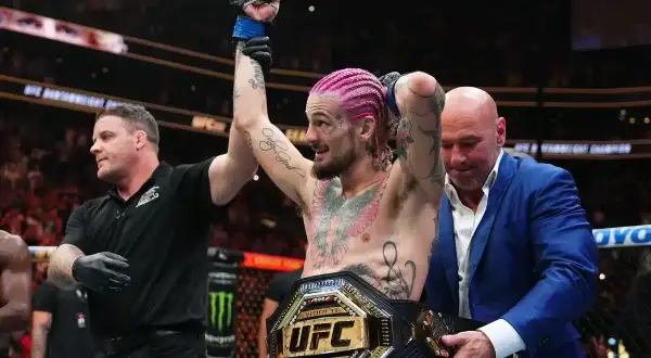 Sean O'Malley wins by split decision vs. Petr Yan, UFC President Dana White presents the belt.