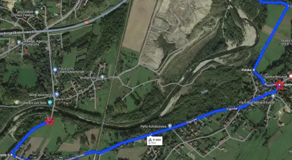 Trasa rowerowa velo soła biegnie przez malownicze tereny, mijając sklep spożywczy, wulkanizację i aptekę.