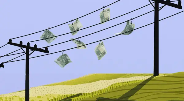 Pieniądze wiszą na przewodach energetycznych, symbolizując wysokie rachunki za prąd. Ile kosztuje energia elektryczna?