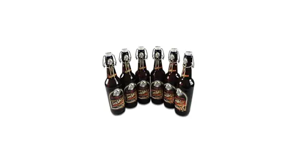 Sechs Flaschen Mönchshof Bockbier mit Bügelverschluss stehen nebeneinander.
