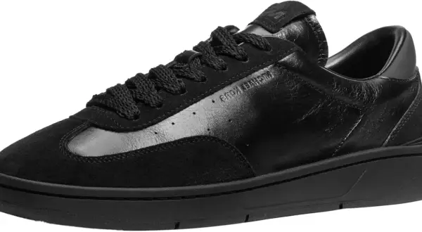 Sneakers uomo Michael Kors nere in pelle e camoscio, un look audace per ogni occasione.