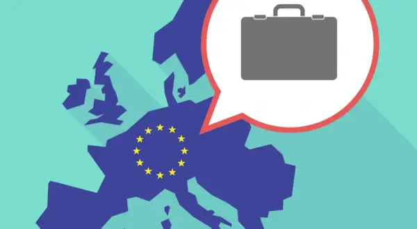 Mapa Europy z gwiazdami UE i dymkiem z walizką, symbolizującą handel i inwestycje, np. w ramach Euro Stoxx 50.