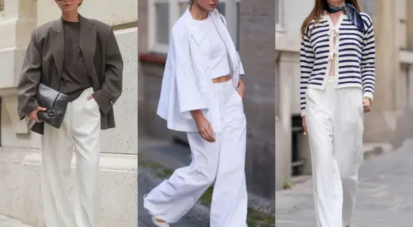 Trzy kobiety prezentują eleganckie białe spodnie w różnych stylizacjach. Jedna w brązowej marynarce, druga w białym komplecie, trzecia w granatowo-białym sweterku.