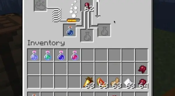 W ekwipunku gracza Minecraft widać sfermentowane oko pająka, gotowe do użycia w stojaku alchemicznym.
