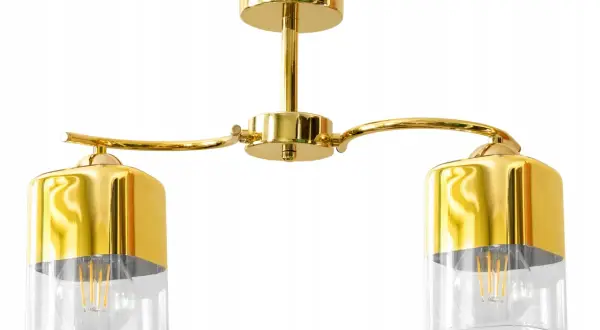 Elegancka lampa szklana loft w złotym kolorze, z dwoma kloszami i widoczną żarówką.