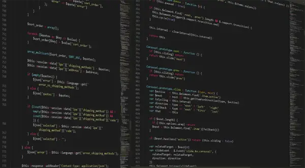 Fragment kodu PHP z komentarzem: `// To jest komentarz w PHP`. Widać pętle `foreach` i `array_multisort`.