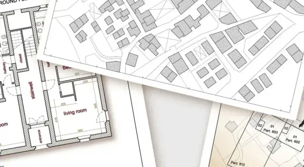 Piani catastali e planimetrie di edifici, con dettagli su stanze e particelle. Un esempio di categoria B1 catasto.