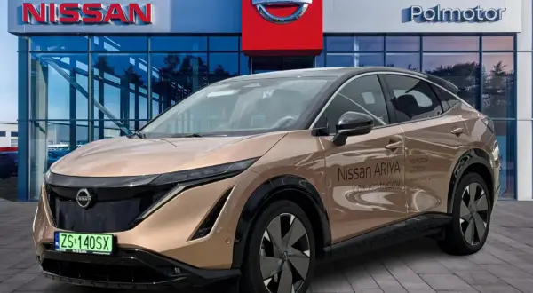Złoty Nissan Ariya 100% elektryczny na placu dealera Polmotor. Czekamy na nissan ariya test!