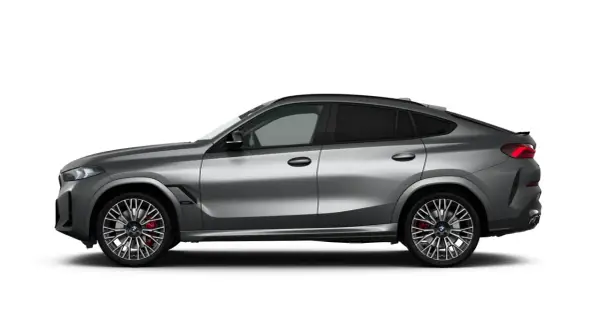 Srebrne BMW X6M z przyciemnianymi szybami i sportowymi felgami, gotowe do dynamicznej jazdy.