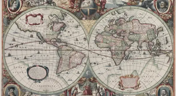 Stara, kolorowa mapa świata z portretami i ozdobnymi ramkami.