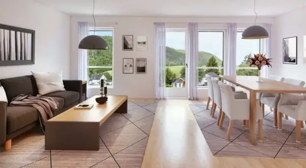 Soggiorno luminoso con divano, tavolino e zona pranzo. Ideale per capire dove posizionare il tavolo in soggiorno, vicino alle finestre per godere del panorama.