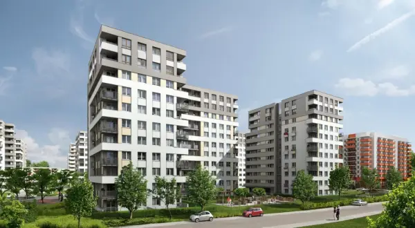 Nowoczesne budynki mieszkalne na osiedlu Avia Kraków. Zieleń, chodniki i samochody tworzą przyjazną przestrzeń.