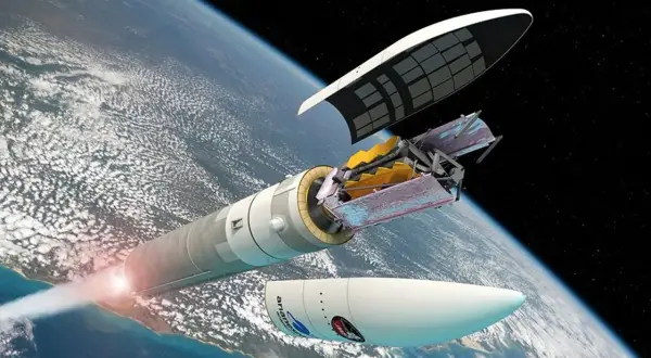Ilustracja rakiety Ariane 5 wynoszącej teleskop Jamesa Webba na orbitę Ziemi.