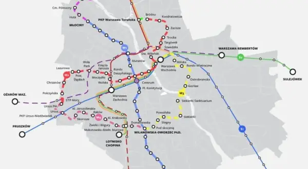 Mapa pokazuje stacje metra M2 i inne linie kolejowe w Warszawie, z zaznaczonymi przystankami i nazwami.