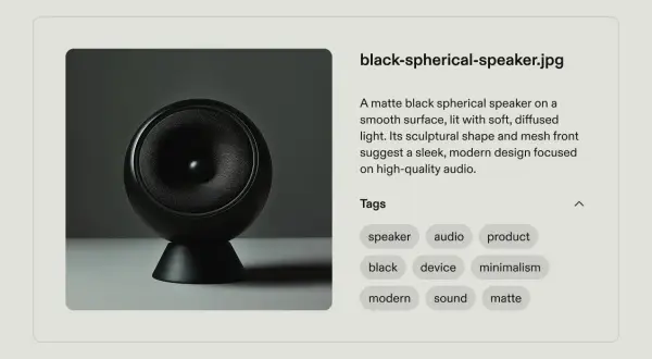A matte black spherical speaker, a sleek modern audio device, perfect for developing a content taxonomy.