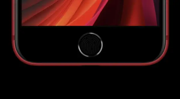 iPhone SE rouge avec son bouton d'accueil et son empreinte digitale pour le déverrouillage.