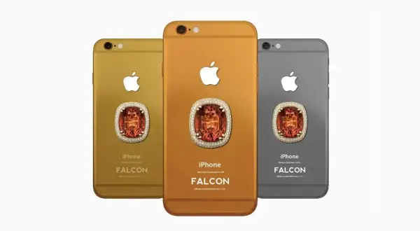 Trzy iPhone'y 6 w kolorach złota, miedzi i platyny, ozdobione kamieniem przypominającym różowy diament. Falcon Supernova.