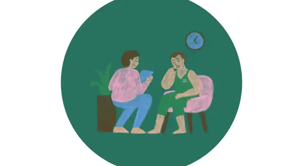 Terapia. Pacjent opowiada o swoich problemach, a terapeuta notuje w dzienniku uczuć.
