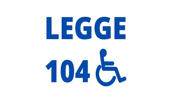 Legge 104 e il verbale INPS per l'indennità di accompagnamento. Simbolo disabilità.