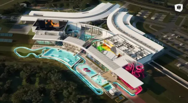 Nowoczesny aquapark Rzeszów z basenami, zjeżdżalniami i strefą relaksu. Widok z lotu ptaka na kompleks wodny.