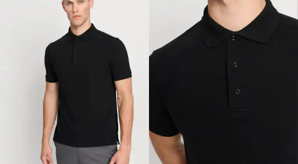 Ein Mann präsentiert ein schwarzes Polohemd, das sich vielseitig kombinieren lässt. Perfekt zu grauen Chinos für einen lässigen Look.