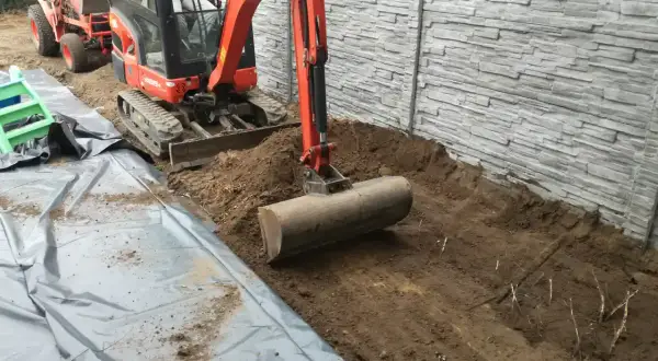 Jak skutecznie wyrównać ziemię na działce i uniknąć problemów z gruntem