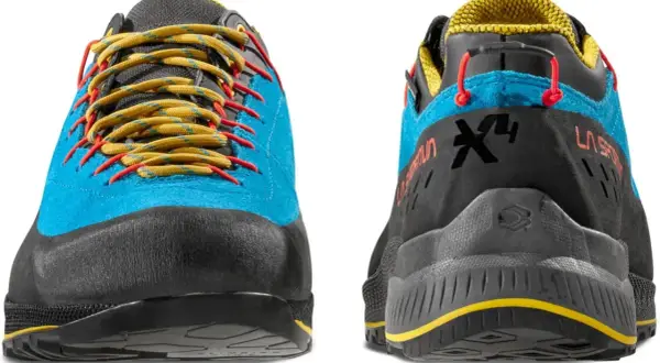 Buty La Sportiva TX4 Evo w kolorze niebieskim z żółtymi sznurówkami i czerwonymi akcentami. Idealne na górskie wyprawy.