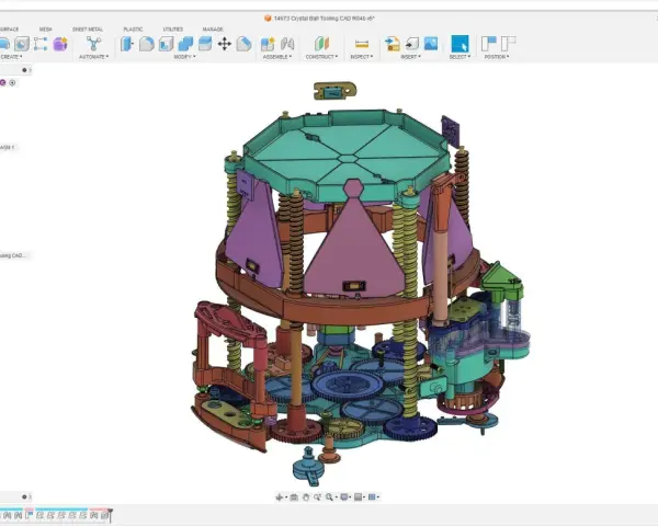 Złożony mechanizm zębatek i elementów, stworzony w programie Autodesk 123d, przypomina skomplikowany zegar lub urządzenie.