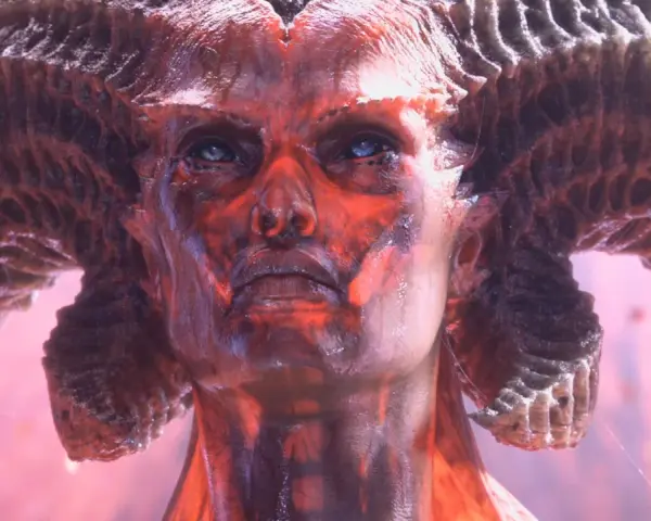 Diablo 4 aktualizacja: przerażająca twarz demona z rogami, oświetlona czerwonym blaskiem.