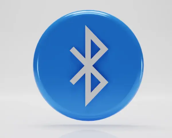 Niebieski okrąg z symbolem Bluetooth. Tak działa bezprzewodowe połączenie między urządzeniami.