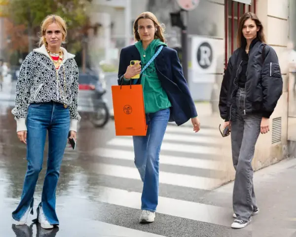 Cinque donne sfoggiano un outfit jeans a zampa e sneakers, con stili diversi e accessori alla moda.