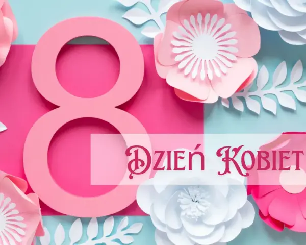 Różowa ósemka i kwiaty z papieru tworzą dekorację na Dzień Kobiet.