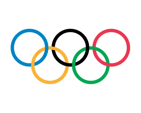 Pięć splecionych kół symbolizujących jedność i ducha sportu - flaga olimpijska.