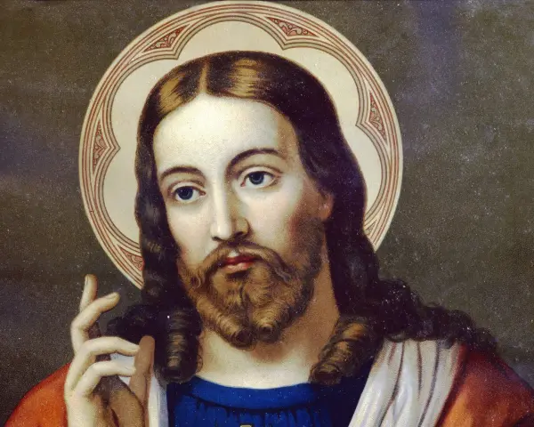 Porträt Jesu Christi mit Heiligenschein, der die Frage "wer ist Gott" in sich trägt.