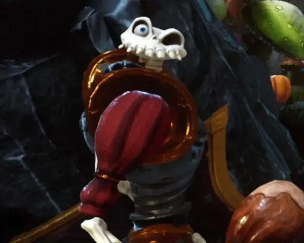 Esqueleto con armadura dorada y roja, listo para la acción en MediEvil PS4.